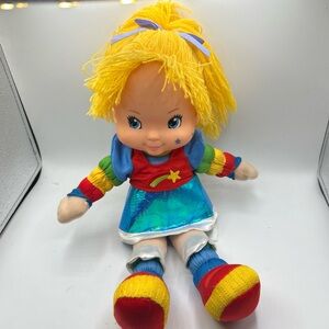 Rainbow Plush Star Doll with Yellow Yarn Hair and Multicolor Outfit
